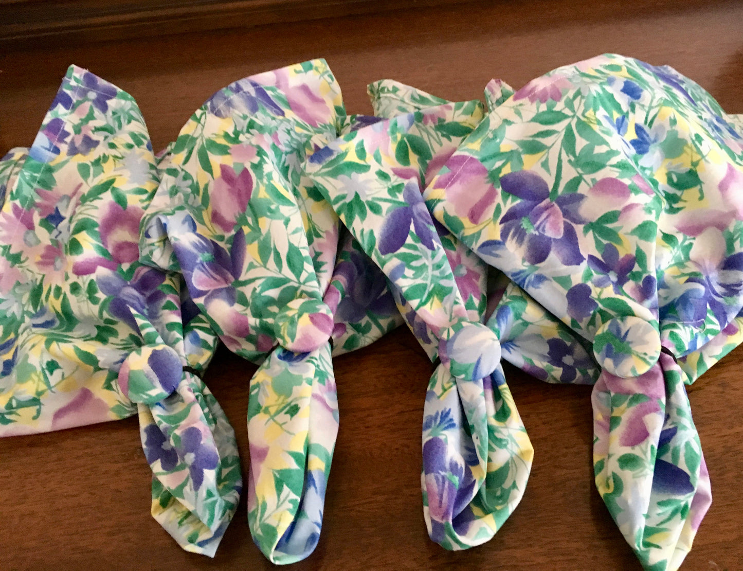 Floral print cloth napkins with matching napkin rings