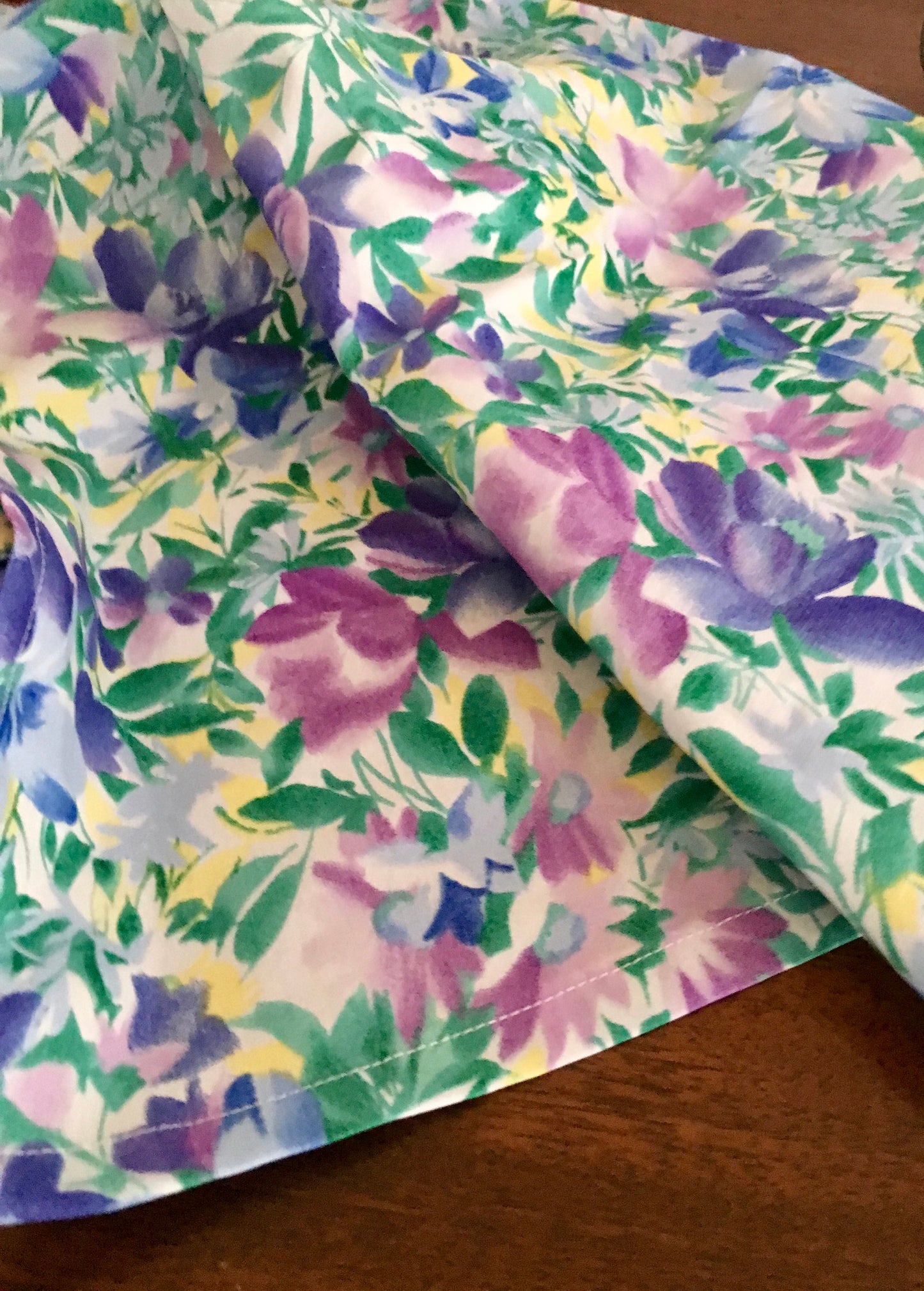 Floral print cloth napkins with matching napkin rings